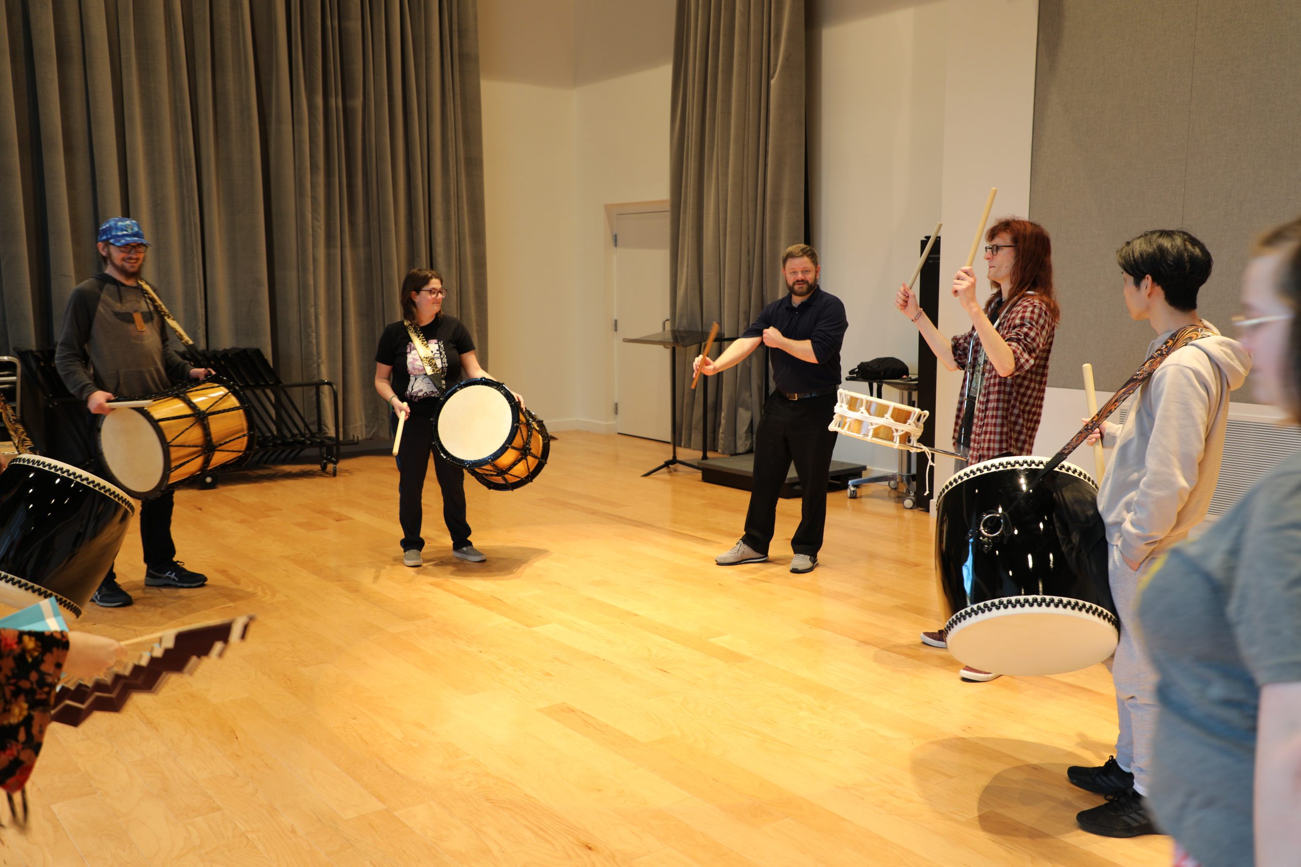 Kyle Maclauchlan hosts a club for "The Japanese Festival Music Team." Within this club, students learn how to play and perform traditional Japanese music.
