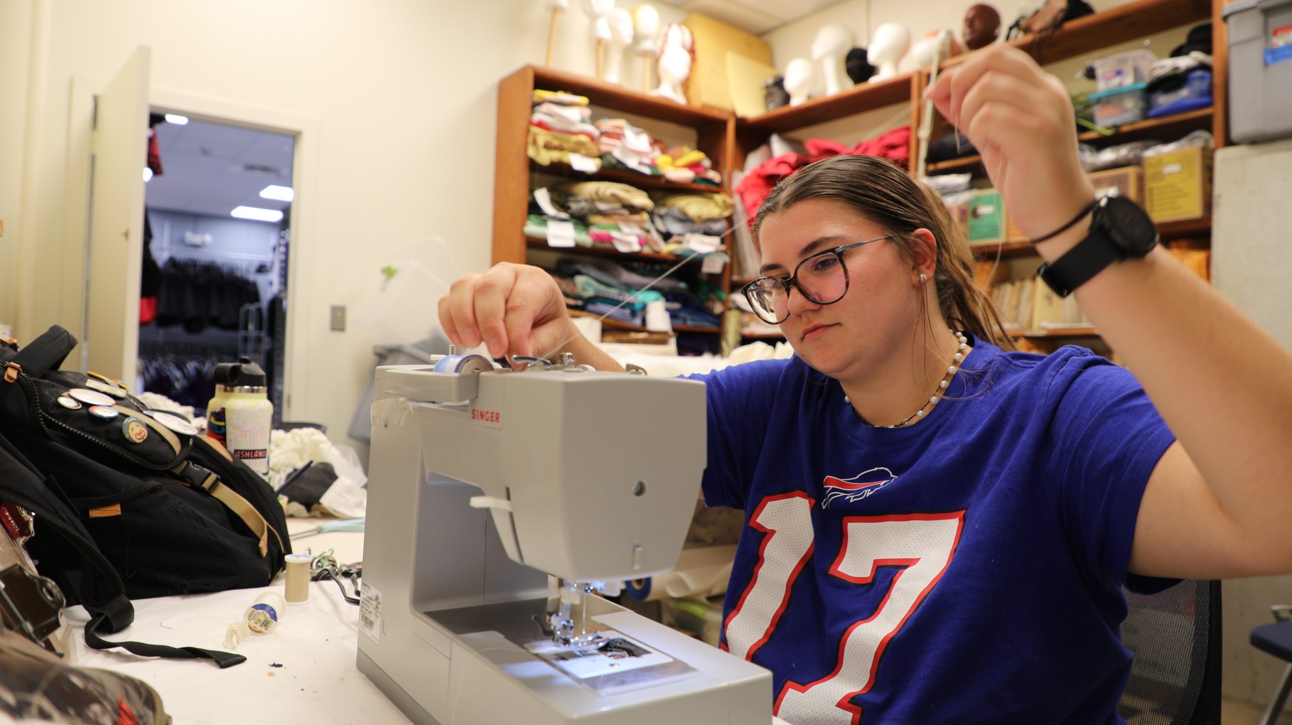 Behind the scenes photos of students prepping for their performance.