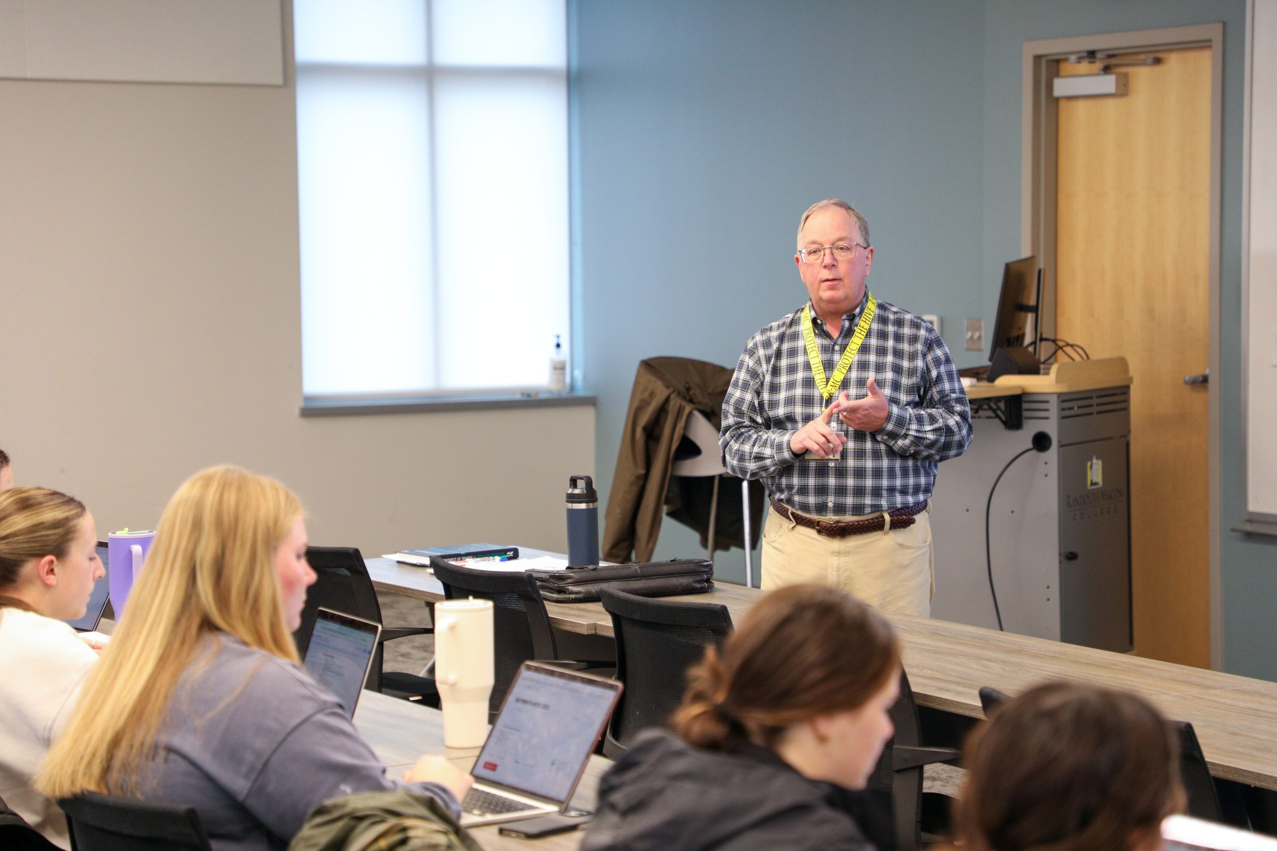 Business Professor, Steve Lang, lectures on the economics of Sports